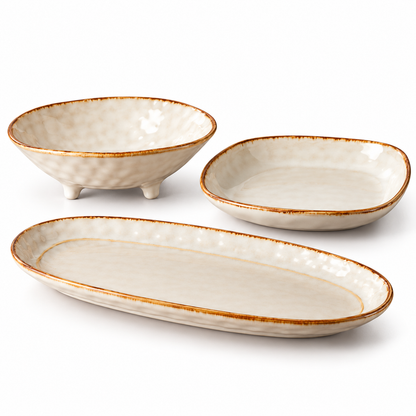 Three-Piece Ivory Serving Dish Set with Rustic Brown Rims, Oval Platter & Footed Bowl — isolated on white background